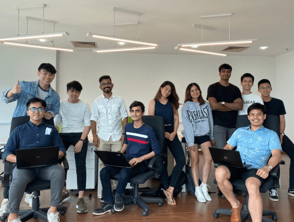 Sigmaschool graduates celebrating after completing the AI-native developer programme
